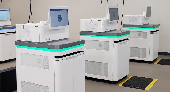 Photo of machines in the Genome Center lab